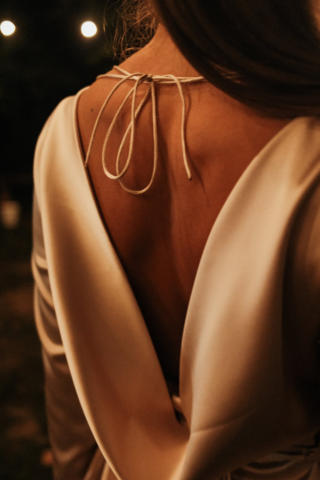 Glowelle – Gold Open-Back Mini Dress